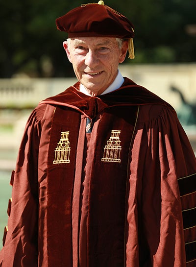 Chuck Corley in graduation robe